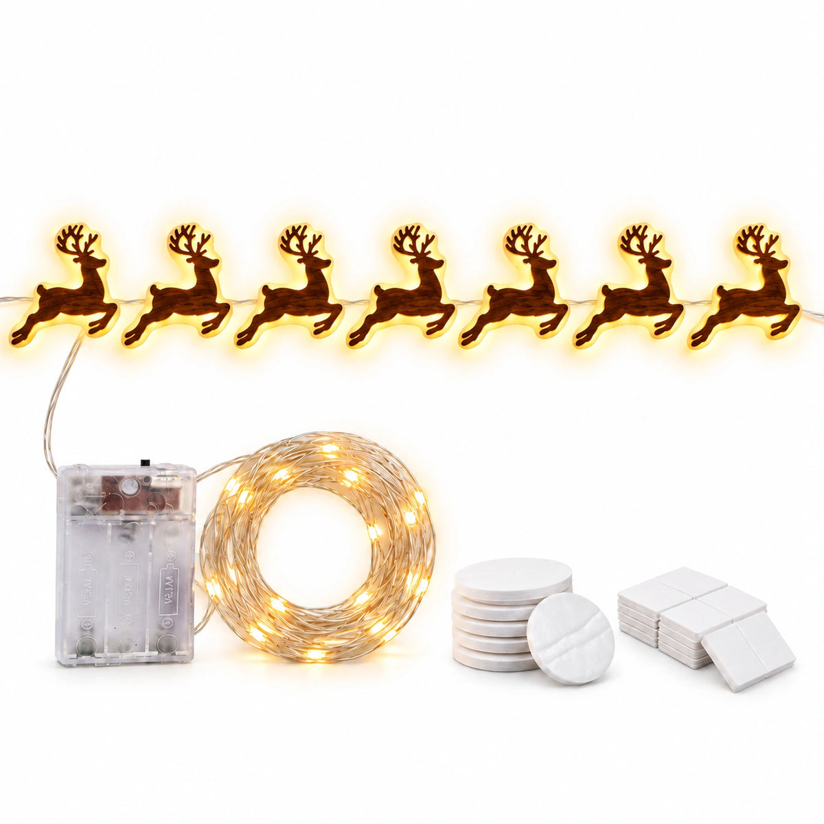 RGB LED gingerbread man Christmas lights featuring seven glowing gingerbread figures, a multicolor remote control and five button batteries on a white background.