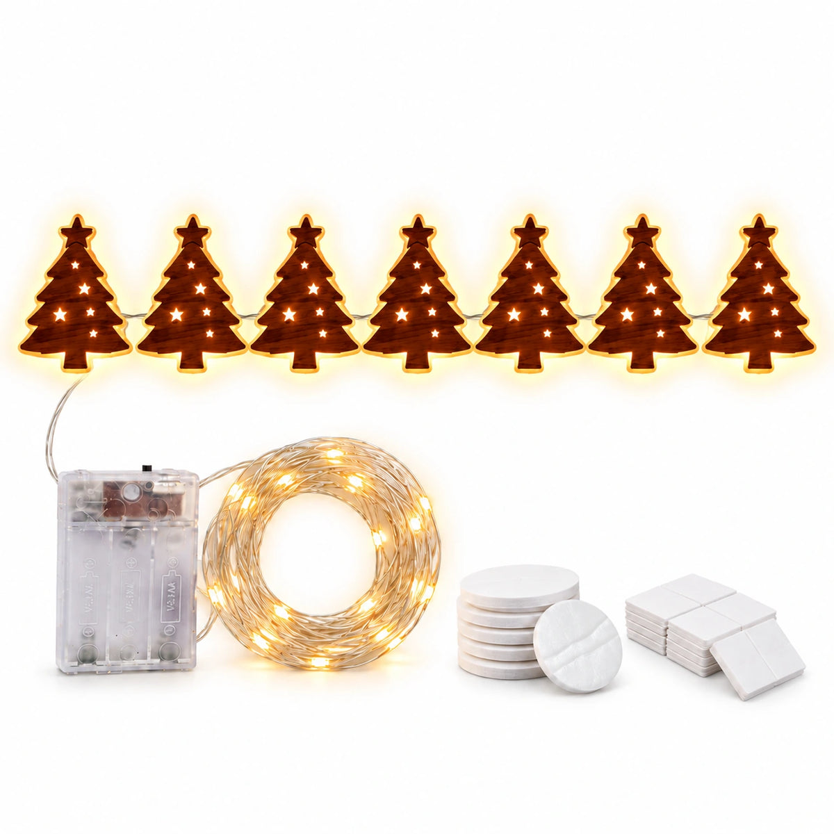 Warm white LED Christmas tree light string featuring seven glowing tree silhouettes with star toppers, a battery box, coiled lights and adhesive mounting pads.